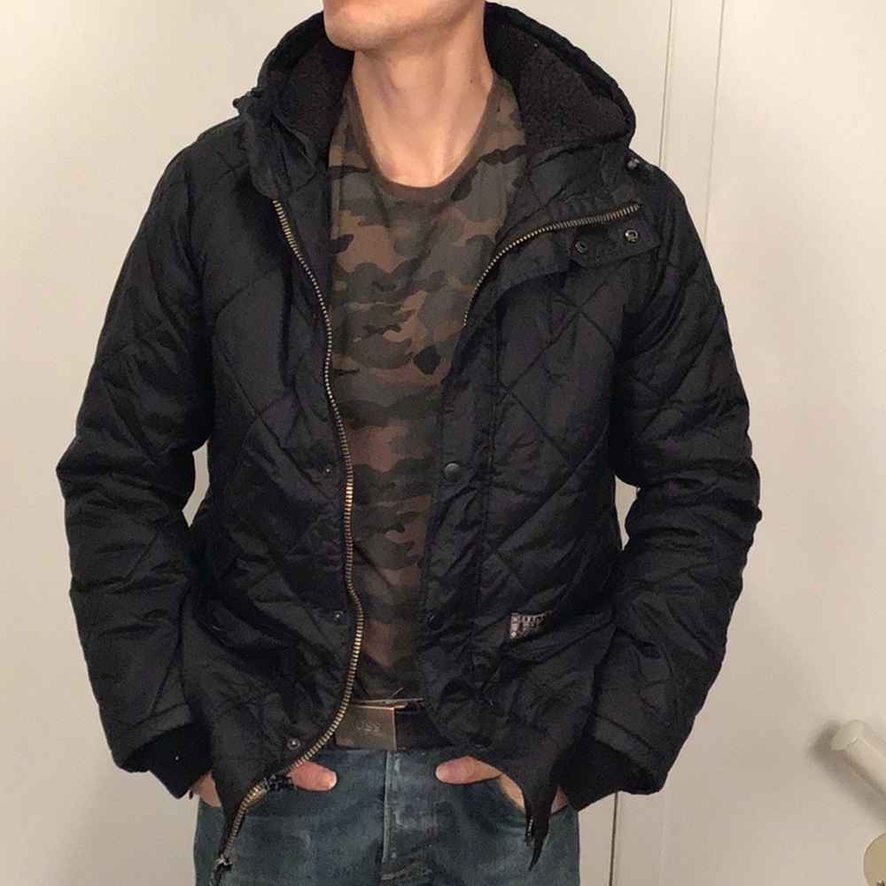 Hurley quilted coat with hoodie and fleece on the inside. Size medium.